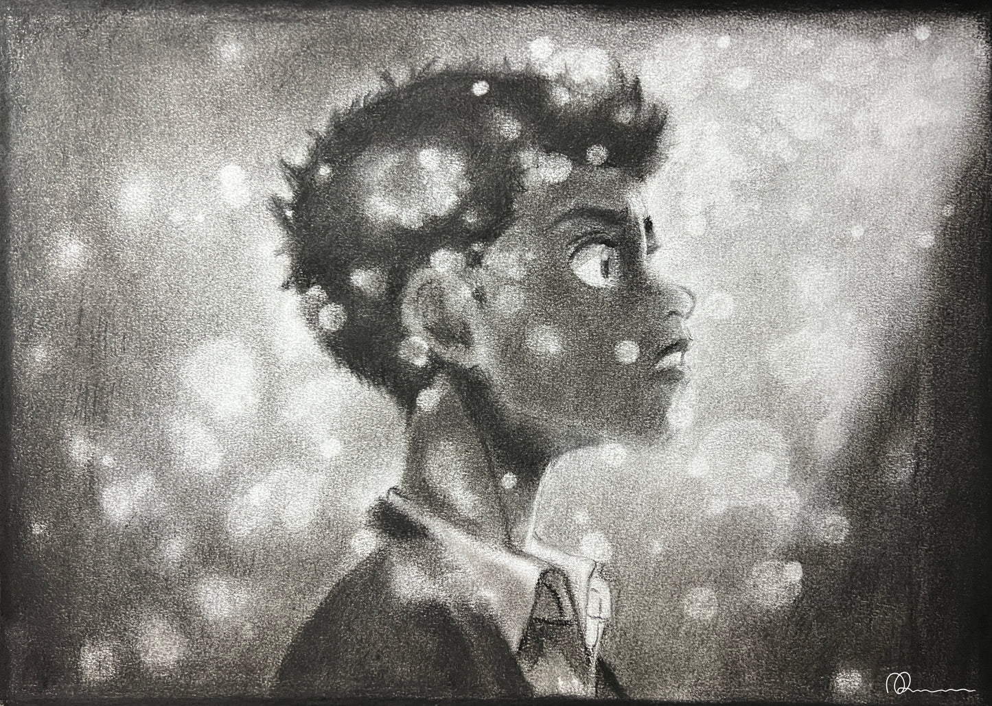 A black and white art print of a person looking upwards, surrounded by abstract shapes resembling stars or lights.