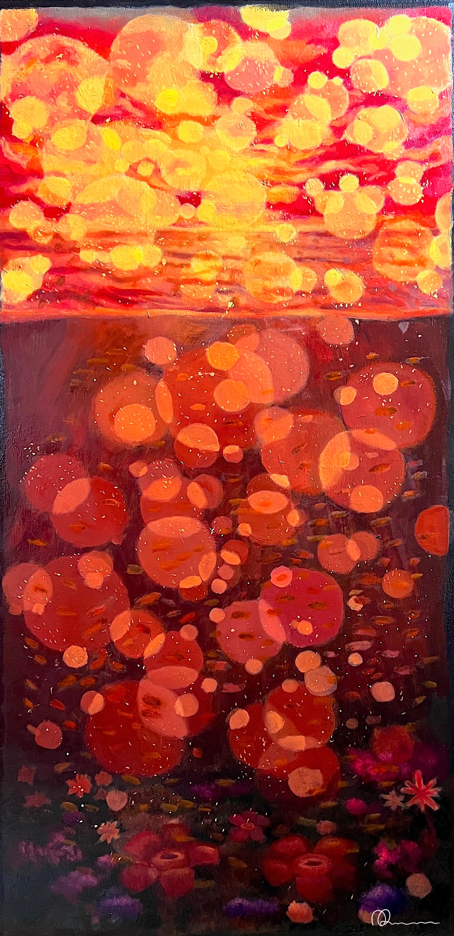 An art print featuring a vibrant sunset with orange and red hues, and abstract blue circles.