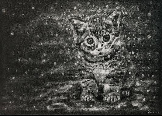 Black and white drawing of a kitten in a snowy scene
