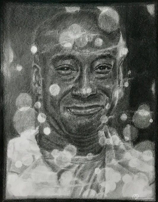 Black and white portrait of a person with a textured surface