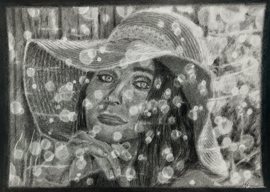 Black and white illustration of a person wearing a wide-brimmed hat with floral patterns.